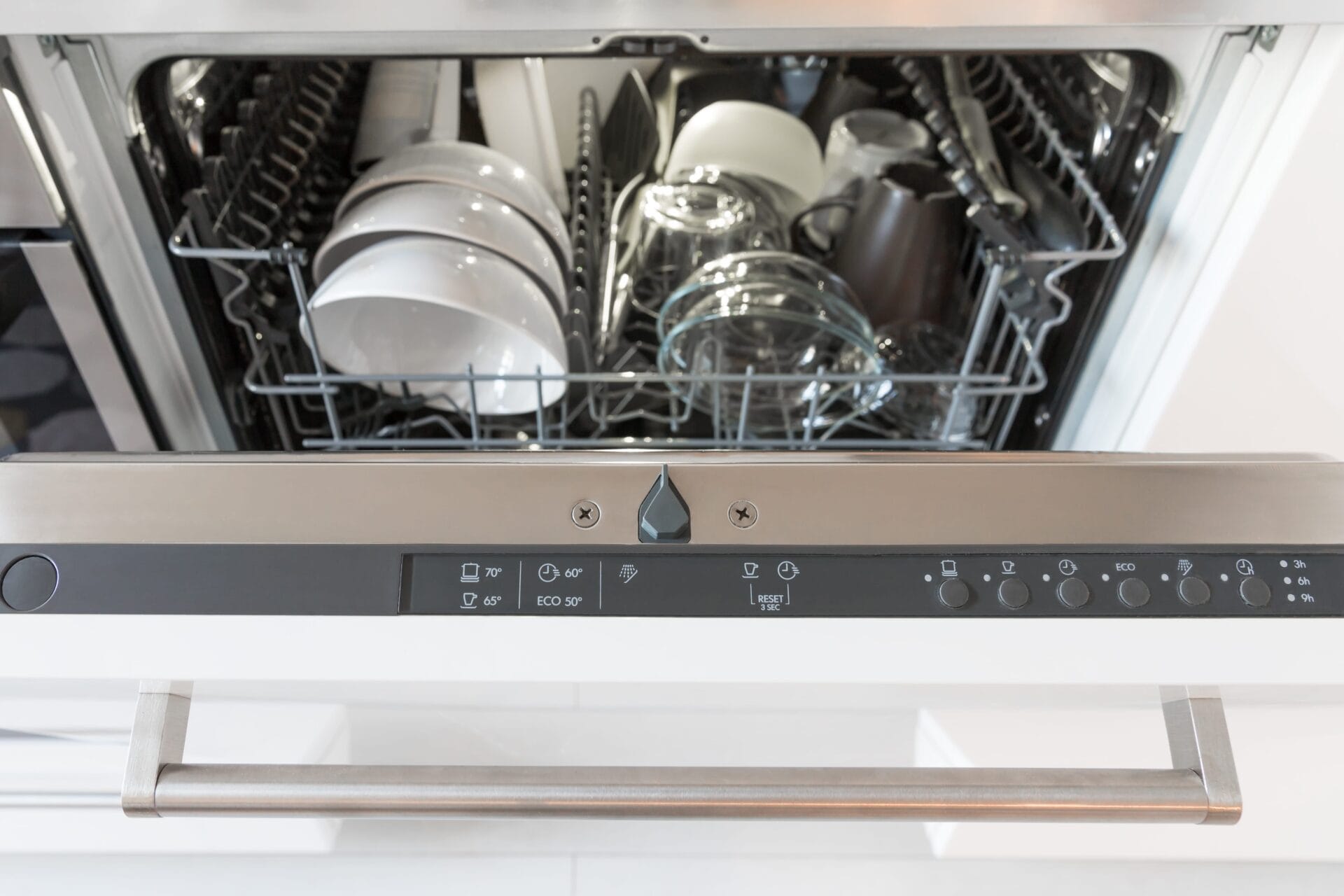 open-dishwasher-with-clean-dishes-in-a-white-kitch-2025-03-08-18-49-02-utc-min